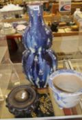 A Chinese double gourd shaped vase; approximately 55cm high and wooden stand and one blue and