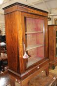 A Victorian rosewood and inlaid pier cabinet 97cm high, 30cm wide and another similar with gilt