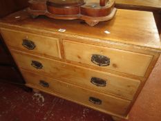 A Victorian pine chest of two short and two long drawers and a Victorian mahogany toilet mirror