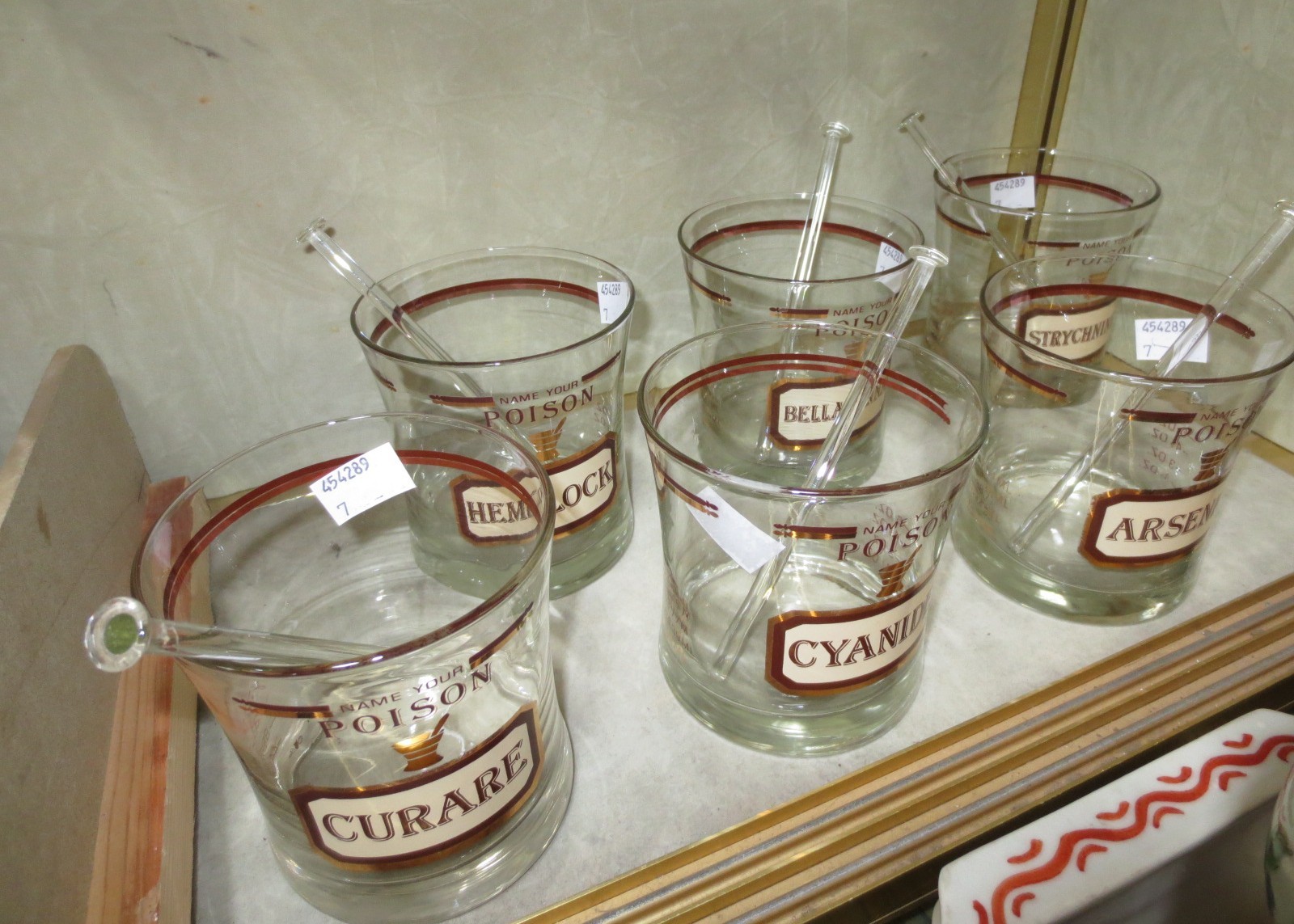 Six glass poison beakers with glass stirrers, Arsenic, Hemlock, Belladonna etc.