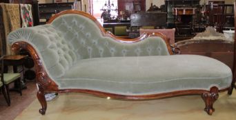 A Victorian walnut framed chaise longue, matching armchair and side chair