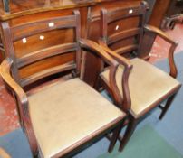 A set of eight George III mahogany and inlaid dining chairs including two armchairs, each with bar