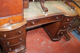 A Victorian pedestal desk (adapted) fitted with nine drawers