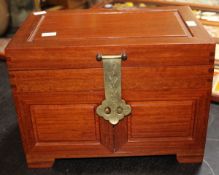 A fully fitted silk-lined jewellery cabinet c/w brass hasp and locks together with a set of fish