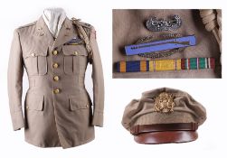 A Second World War USAAF Officer`s Tunic and Peaked Crusher Type Cap, complete with metal and