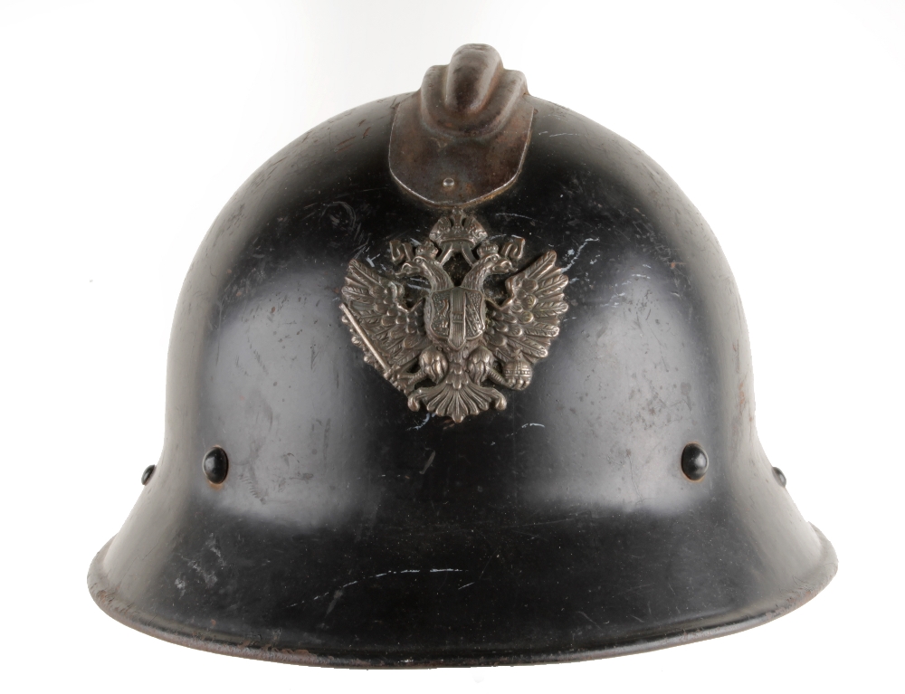 An Unusual Russian M26 Adrian Style Steel Helmet, the shell retaining much of its original black