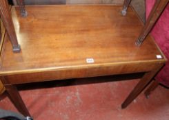 A mahogany tray top table on square tapered legs 84cm x 53cm