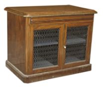 A mahogany and brass mounted library cabinet with twin grill doors 126cm wide