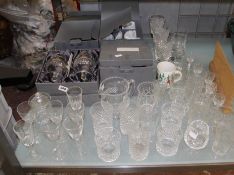 A mixed selection of glassware including Waterford examples, decanters and jugs, etc.