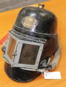 A Second World War Siebe Gorman Fire-Fighter`s Helmet, complete with bellows foot-pump A National