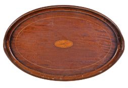 A mahogany and marquetry tray in George III style, late 19th century, of oval form, with central fan
