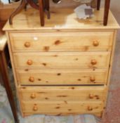 A modern pine chest of five long drawers 94cm high, 81cm wide
