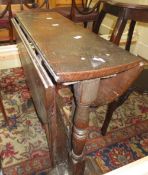 An 18th century oak gateleg table 64c cm high, 92cm extended