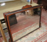 A late Victorian ebonized and inlaid overmantel mirror and an Art Nouveau storage box with brass