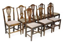 A harlequin set of eight mahogany dining chairs in George III style, 19th century