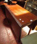 A 19th century mahogany dropleaf table