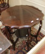 A late Victorian mahogany two tier occasional table