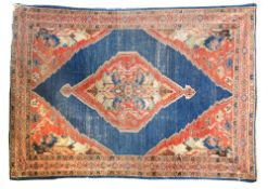 A Zeigler rug, the sea blue field with a stepped medallion and conforming corners, within a triple