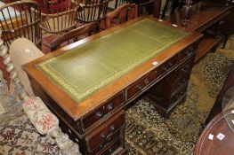 A mahogany pedestal desk in George III style, 20th century 122cm wide