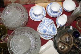 An Edwardian style mantle clock, a silver christening mug, assorted silver plate, part dinner