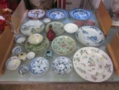 A mixed quantity of predominately Chinese porcelain including blue and white plates, Famille Rose