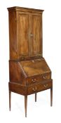 A George III mahogany bureau bookcase, circa 1790, moulded cornice, pair of panelled doors, opening