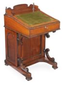 A William IV rosewood Davenport, circa 1835, green leather inset fall opening to small drawers,