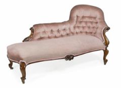 A Victorian rosewood and simulated rosewood button upholstered chaise longue, circa 1860, shaped