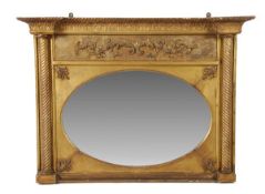 A Regency giltwood and gesso overmantel mirror, circa 1815, inverted breakfront with lappet