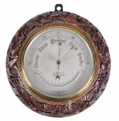 A carved oak aneroid wall barometer with thermometer, R. Bailey, Birmingham, late 19th century, the