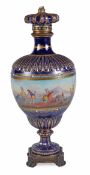 A mid 19th century French pottery and gilt-metal-mounted Sevres-style baluster vase and crown-