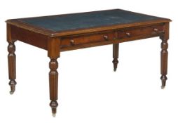 A Victorian oak and leather inset writing table, circa 1880, pair of frieze drawers, turned,