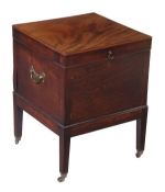 A George III mahogany cellaret, circa 1780, hinged top, on square tapered legs, caps and castors,