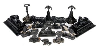 A collection of English domestic metalware, 19th century, including a pair of painted cast iron