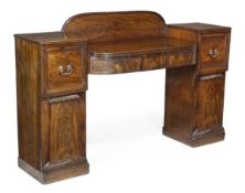 A George IV mahogany pedestal sideboard, circa 1825, rear gallery, central frieze drawer, each