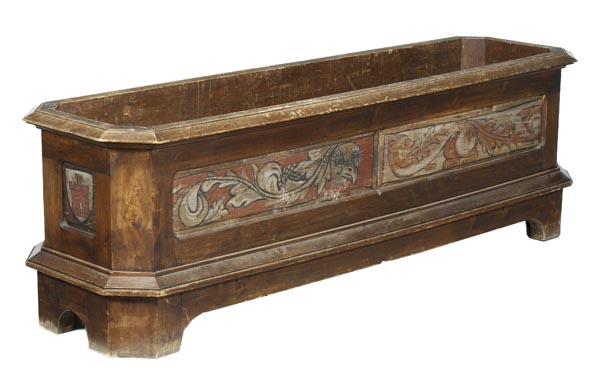 A North European walnut and painted planter, 19th century, rectangular form with canted corners,