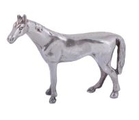 A silver small model of a standing horse, maker`s mark `JS & MJ`, London 1985, 3cm (1 1/2in) high,