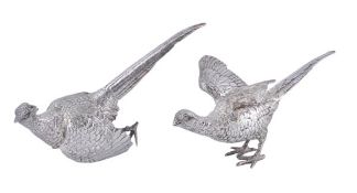 A pair of silver models of pheasants by Edward Barnard & Sons Ltd, London 1970, the cock 15cm (6in)