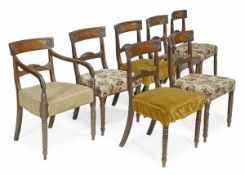 A set of seven George IV mahogany dining chairs, circa 1825, including one armchair, rectangular