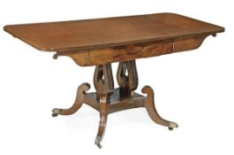 A Regency mahogany and brass inset sofa table, circa 1815, rectangular top incorporating hinged