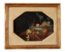 Manner of Cornelis de Heem, Still life of fruit and other items on a ledge, Oil on panel,