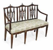 A mahogany framed chair back settee, in 18th century style, 19th century, triple chair back,