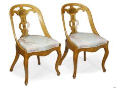 A pair of satin birch side chairs, in Biedermeier style, late 19th/20th century, decorated with