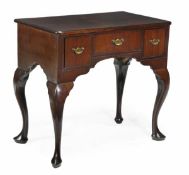 A George II mahogany side table, circa 1740, moulded rectangular top, three drawers, cabriole legs a