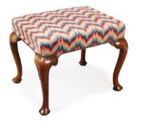 A walnut framed and upholstered stool, in George I style, late 19th/early 20th century style,