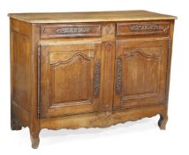 A French fruitwood side cabinet, late 18th/ early 19th century, rectangular top, moulded edge, a