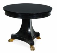 An ebonised and gilt metal mounted circular centre table, in Regency style, 19th century and