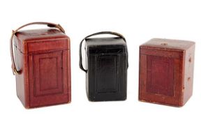 Three French leather covered carriage clock travelling cases Unsigned, late 19th century The first