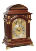A late Victorian gilt brass mounted mahogany quarter chiming bracket clock A. and H. Rowley, London,