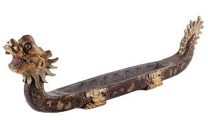 A large Chinese lacquered Ôdragon boatÕ incense timekeeper Unsigned, circa 1800 The elongated body